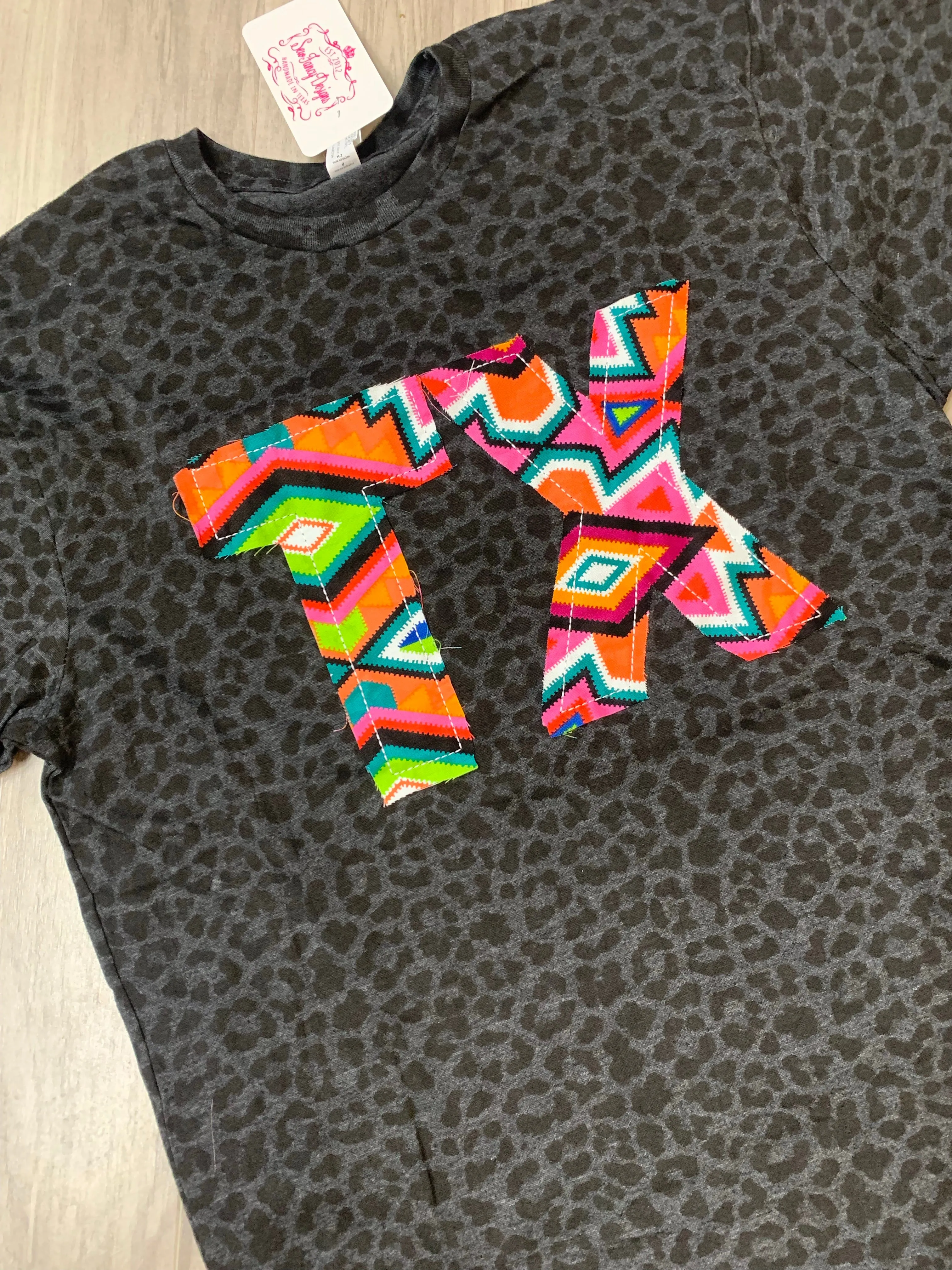 Aztec State Abbreviation Tee